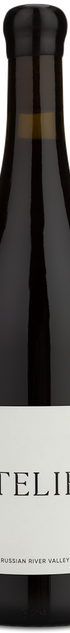 A dark glass wine bottle with a black capsule and a white label reading 'ATELIER' on a plain white background.