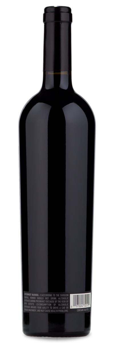 A dark glass 2019 Caymus Special Selection Cabernet Sauvignon bottle, back view, shows a label and barcode near the base.