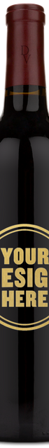 A Duckhorn Vineyards Napa Merlot bottle with a maroon cap and an engraving reading YOUR DESIGN HERE in gold.