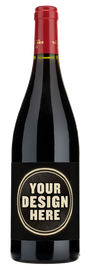 A Familia Torres Salmos Priorat wine bottle with a red cap.