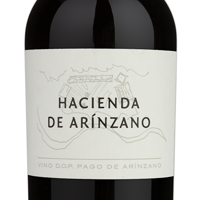 A personalized 2018 Hacienda De Arinzano Tempranillo red wine bottle with white label and black cap, upright.