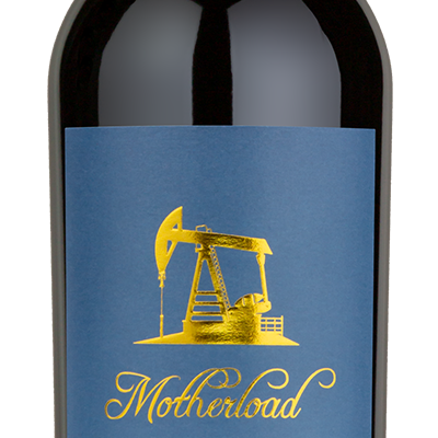A bottle of personalwine Motherload Red Wine Blend with a cream and purple illustrated label.