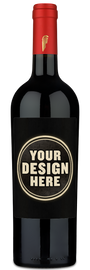 A Tenuta Sette Ponti Crognolo bottle with a blank YOUR DESIGN HERE label, ready to customize.