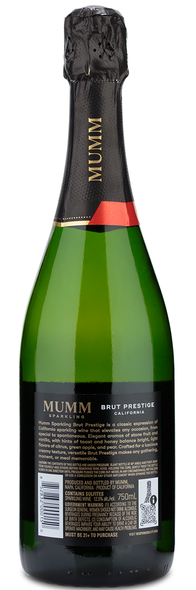 A green bottle of Mumm Napa Brut Prestige sparkling wine with a black and gold label and a red accent near the top.