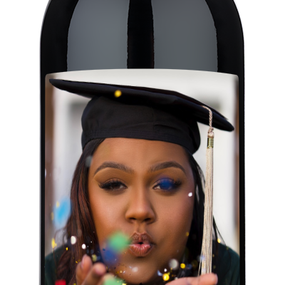 Wine bottle with custom label showing a grad photo, Class of 2025, Molly Gardner | UCLA in text.