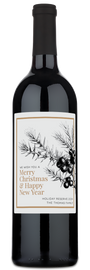 A bottle of Juniper Branch Holiday Reserve wine with a custom Merry Christmas & Happy New Year label.