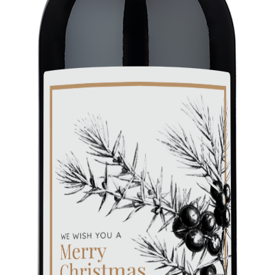 A bottle of Juniper Branch Holiday Reserve wine with a custom Merry Christmas & Happy New Year label.