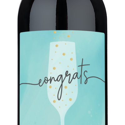 Personalized champagne flute with congrats, Julia & Lucas, 12.31.25 label and gold dot accents on the glass.