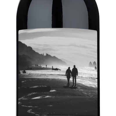 A wine bottle with a custom label reading Sophia & Rafael, Feb 14, 2025.