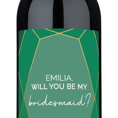 A wine bottle with a label reading, Emilia, will you be my bridesmaid? 11.11.25.