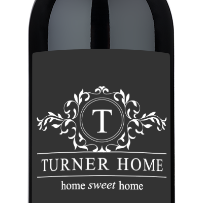 A wine bottle labeled Home Sweet Home and personalized for Turner Home, Dallas, TX, Est. Dec 2025.