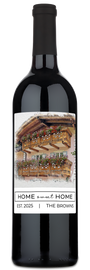 A wine bottle with a Home Sweet Home label featuring floral designs and a balcony illustration, ideal for gifts.
