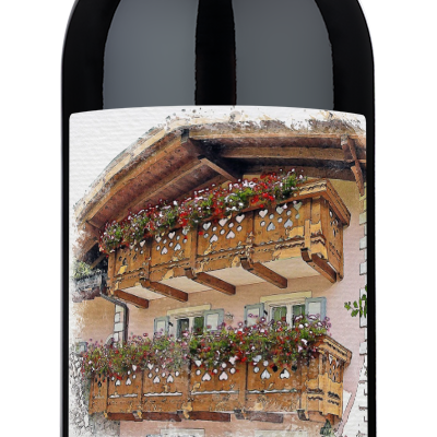 A wine bottle with a Home Sweet Home label featuring floral designs and a balcony illustration, ideal for gifts.