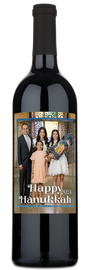 Wine bottle with a custom family photo label and Happy Hanukkah 2024 text.