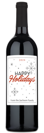 Wine bottle with a snowflake holiday label reading Happy Holidays Jackson Family 2024.