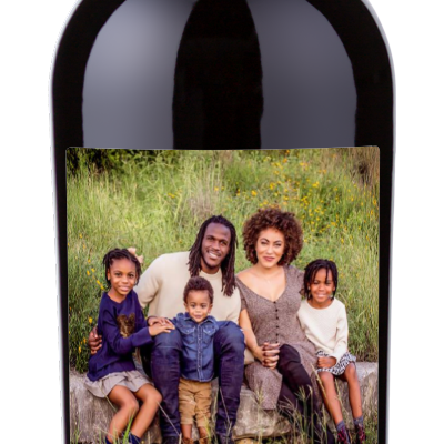 Bottle of wine with a custom label showing a family photo and the text “Happy Father’s Day.”.
