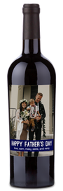 Personalized Father’s Day wine bottle with a family photo and custom message from Sam, Maisy, Stella & Remy on the label.
