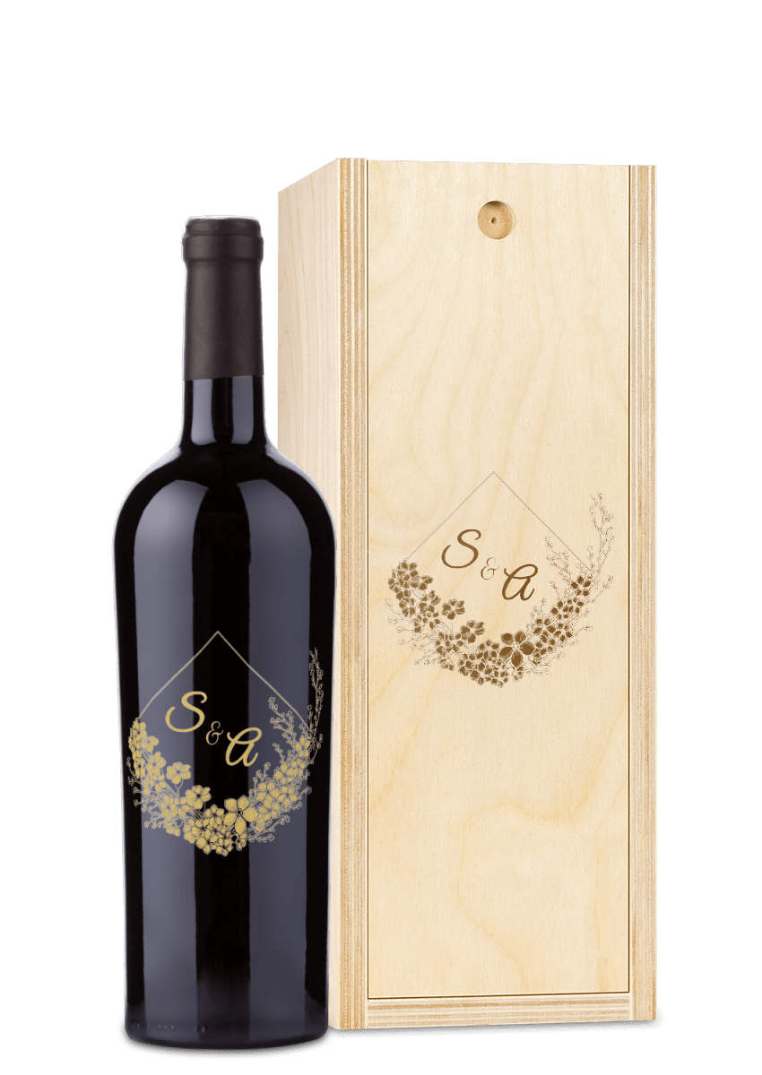 Custom wine and wood box with gold floral designs and large engraved letters S & A on the front.