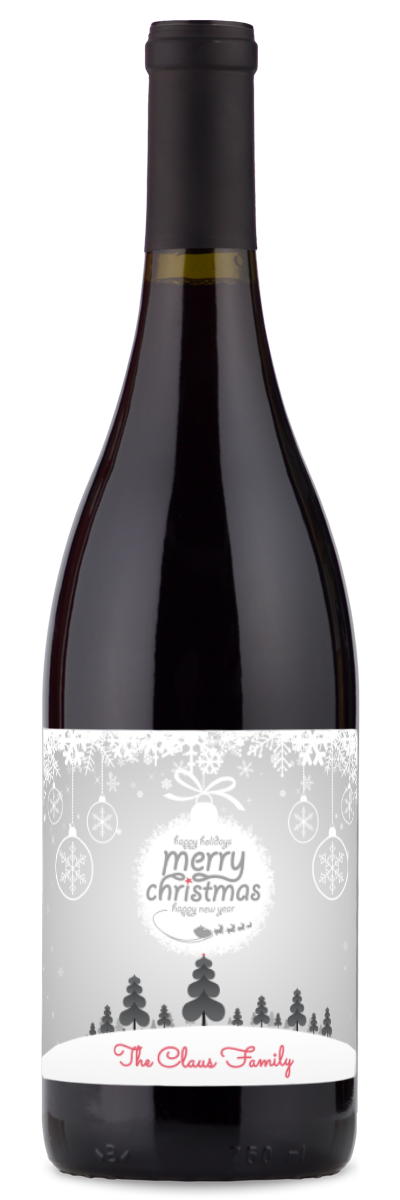 A wine bottle with a Christmas ornament label reading Merry Christmas The Claus Family, decorated with snowflakes and trees.
