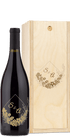 A wood wine box engraved with gold floral patterns and the initials S & A.