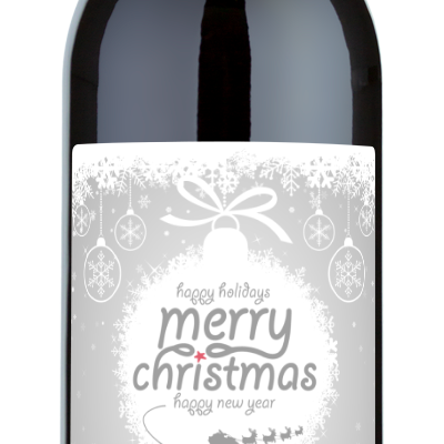 Wine bottle with a festive Christmas ornament label, Merry Christmas and The Claus Family in red at the bottom.