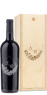 Custom engraved wine and wood box with floral patterns and the initials S & A on the surface.